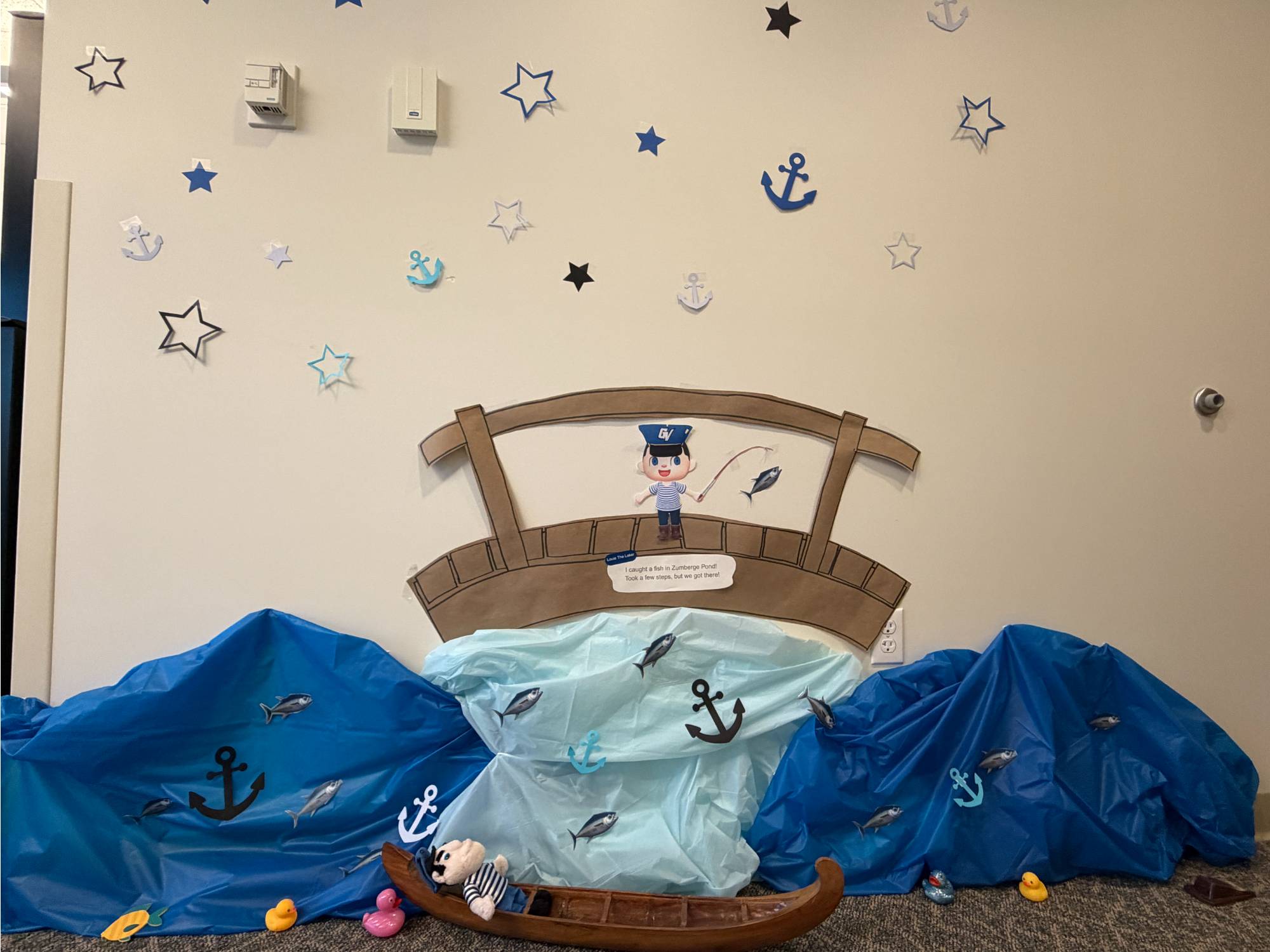 Brooks Homecoming decorating with Louie in the water